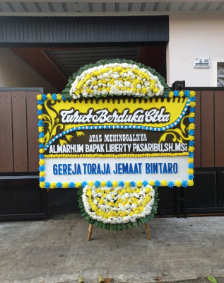 Papan Bunga Duka di Wonotinggal